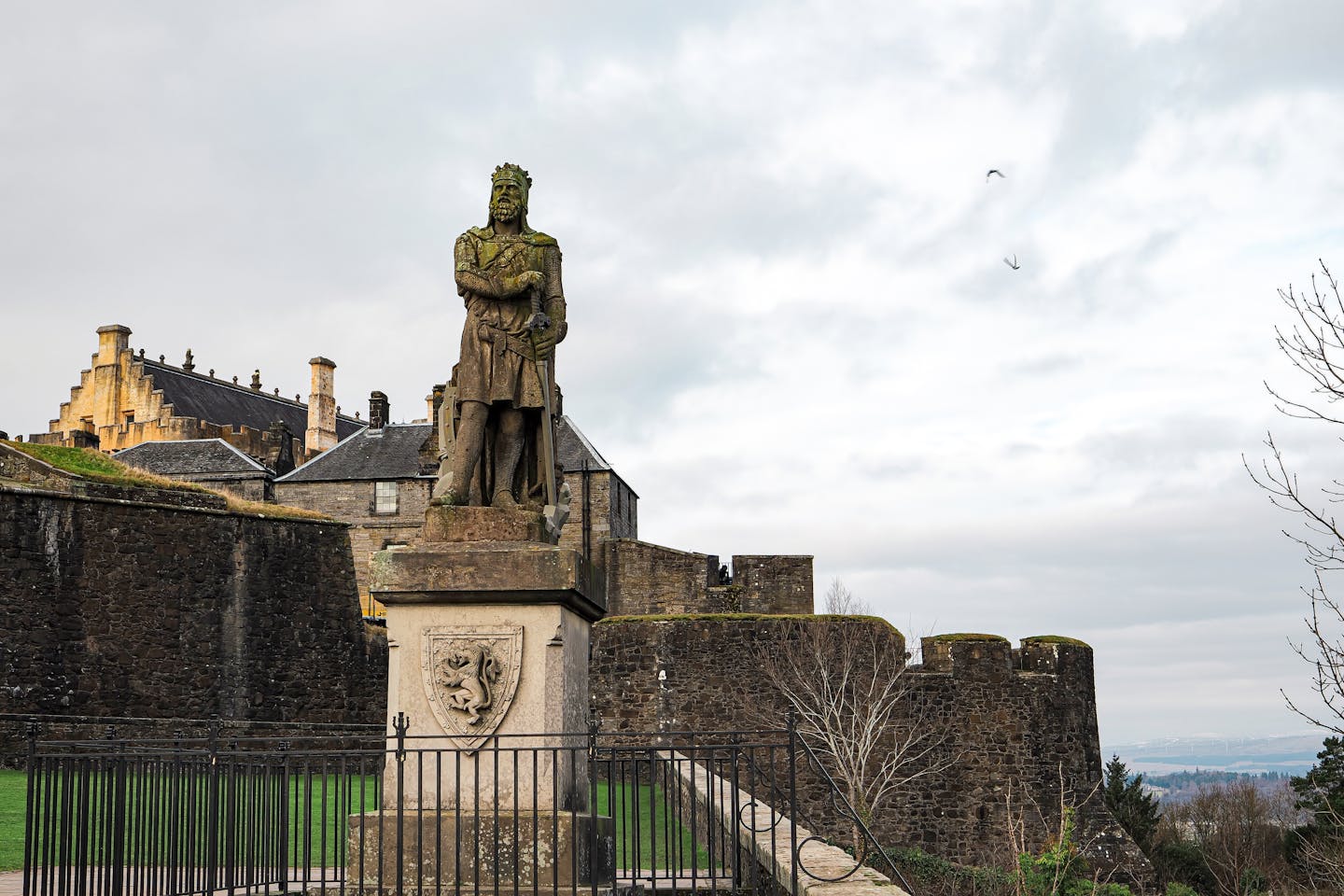 Statue of Robert the Bruce at historic Stirling Castle in Scotland, winter scene.
