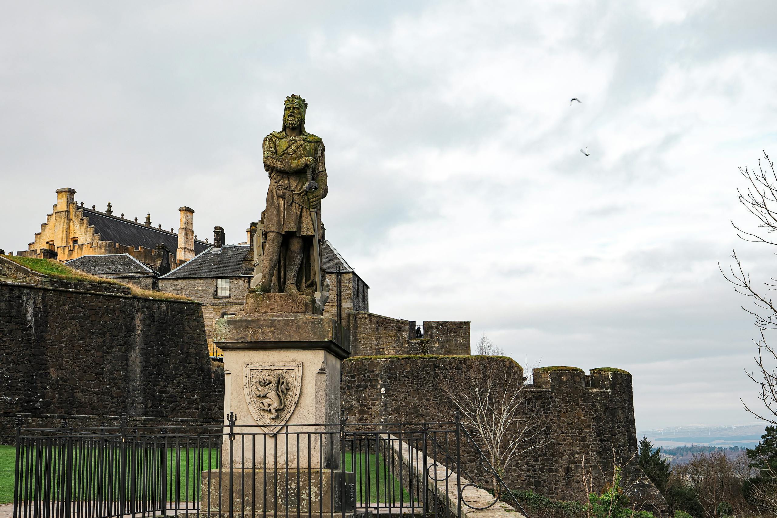 Statue of Robert the Bruce at historic Stirling Castle in Scotland, winter scene.