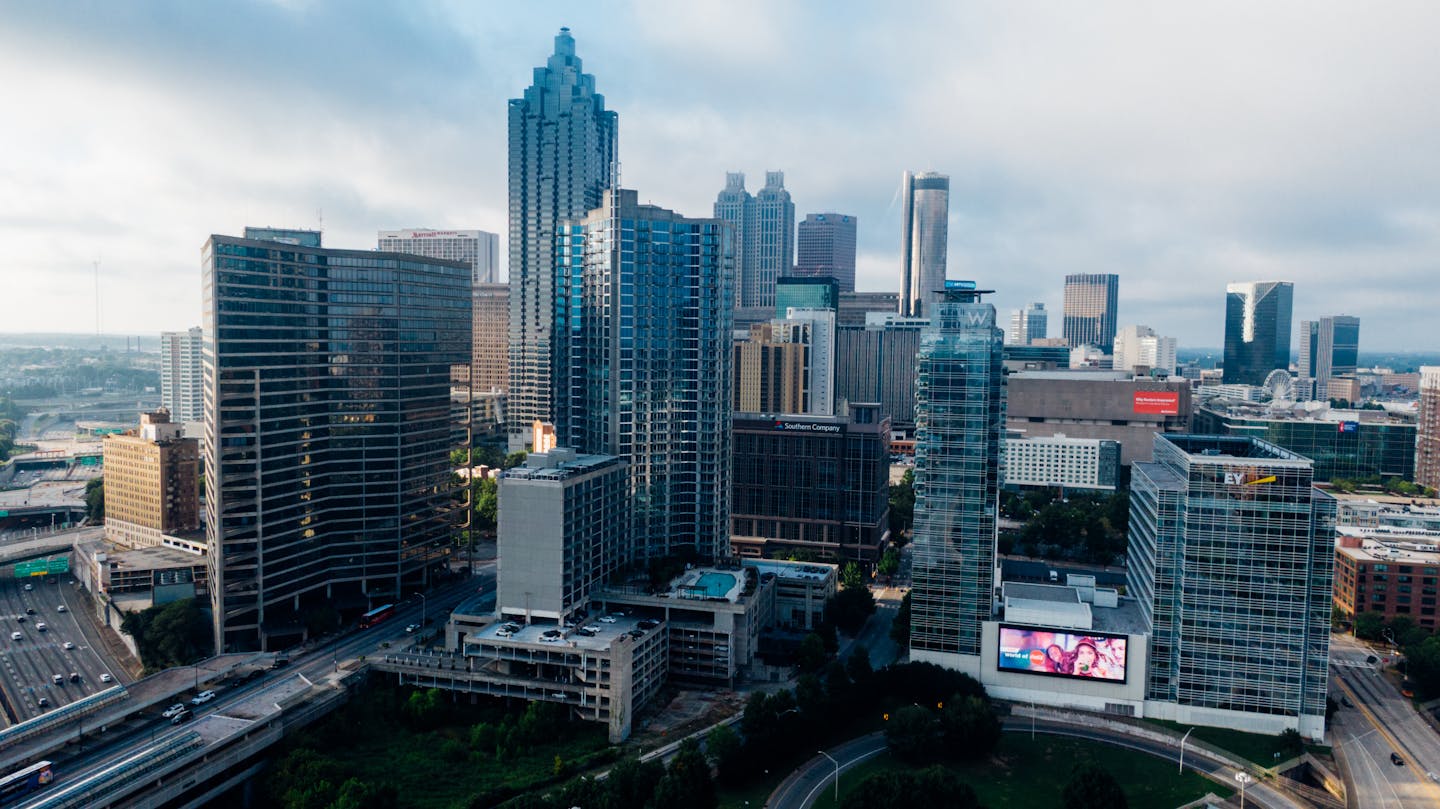 Aerial view of Atlanta's downtown skyline with modern skyscrapers during daytime.