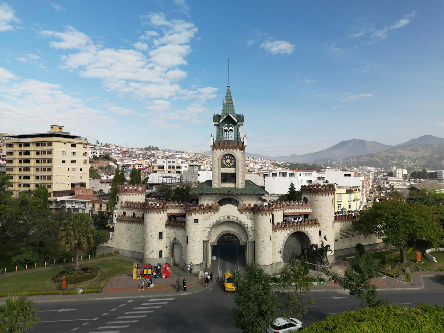 Scenic view of the iconic Gate of the City in Loja, Ecuador, under a bright blue sky.