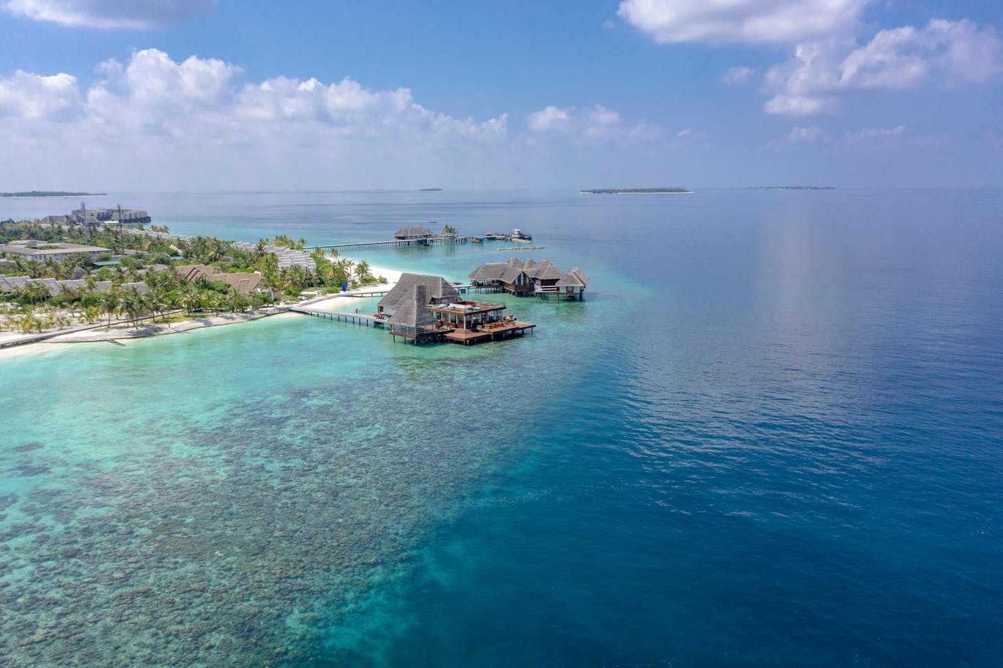 Discover the serene tropical paradise of overwater villas in Meedhoo, Maldives.