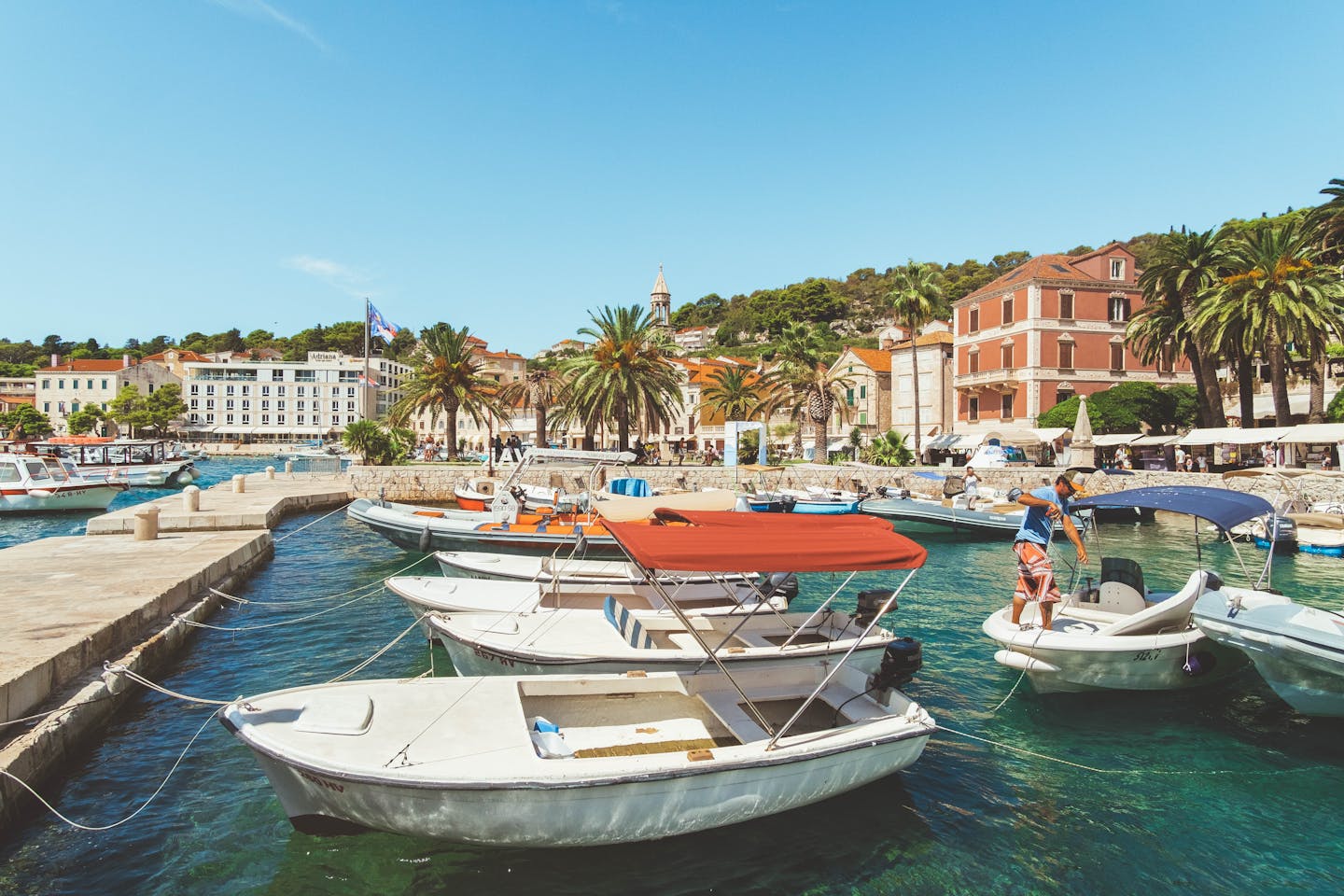 Picturesque view of boats docked at Hvar harbor in Split-Dalmatia County, Croatia.