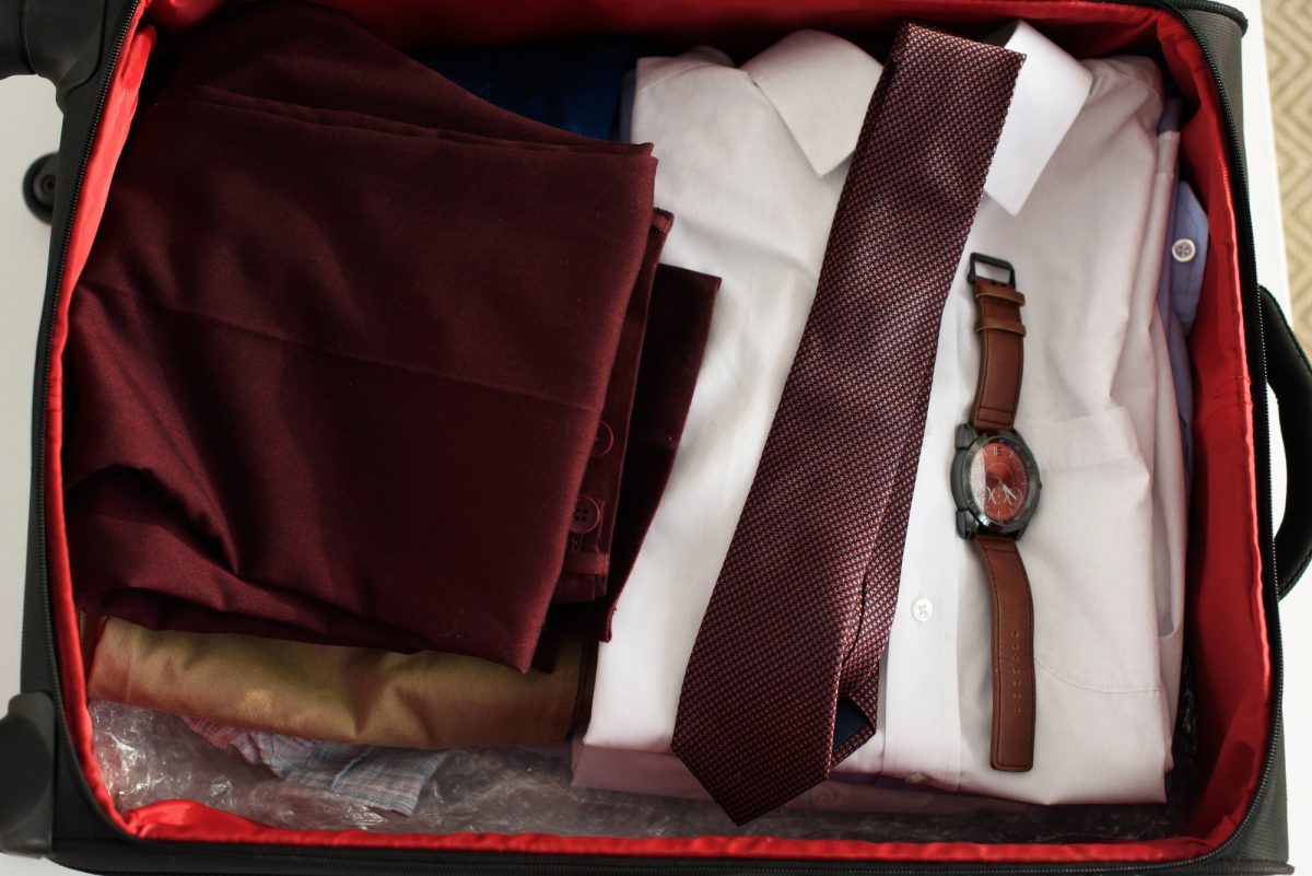 how to fold suits for travel